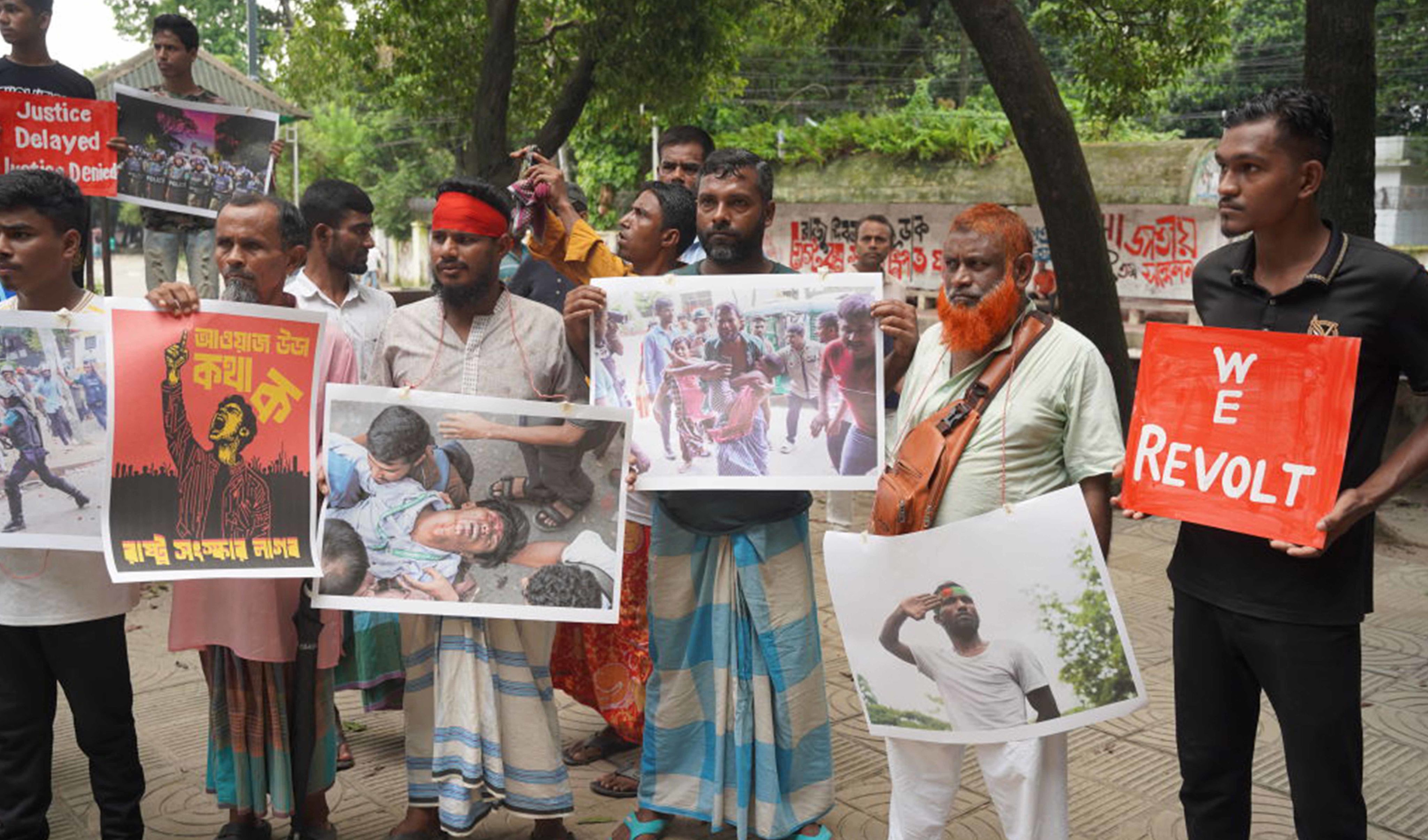 Protesters demanding justice for victims killed during the anti-quota protest