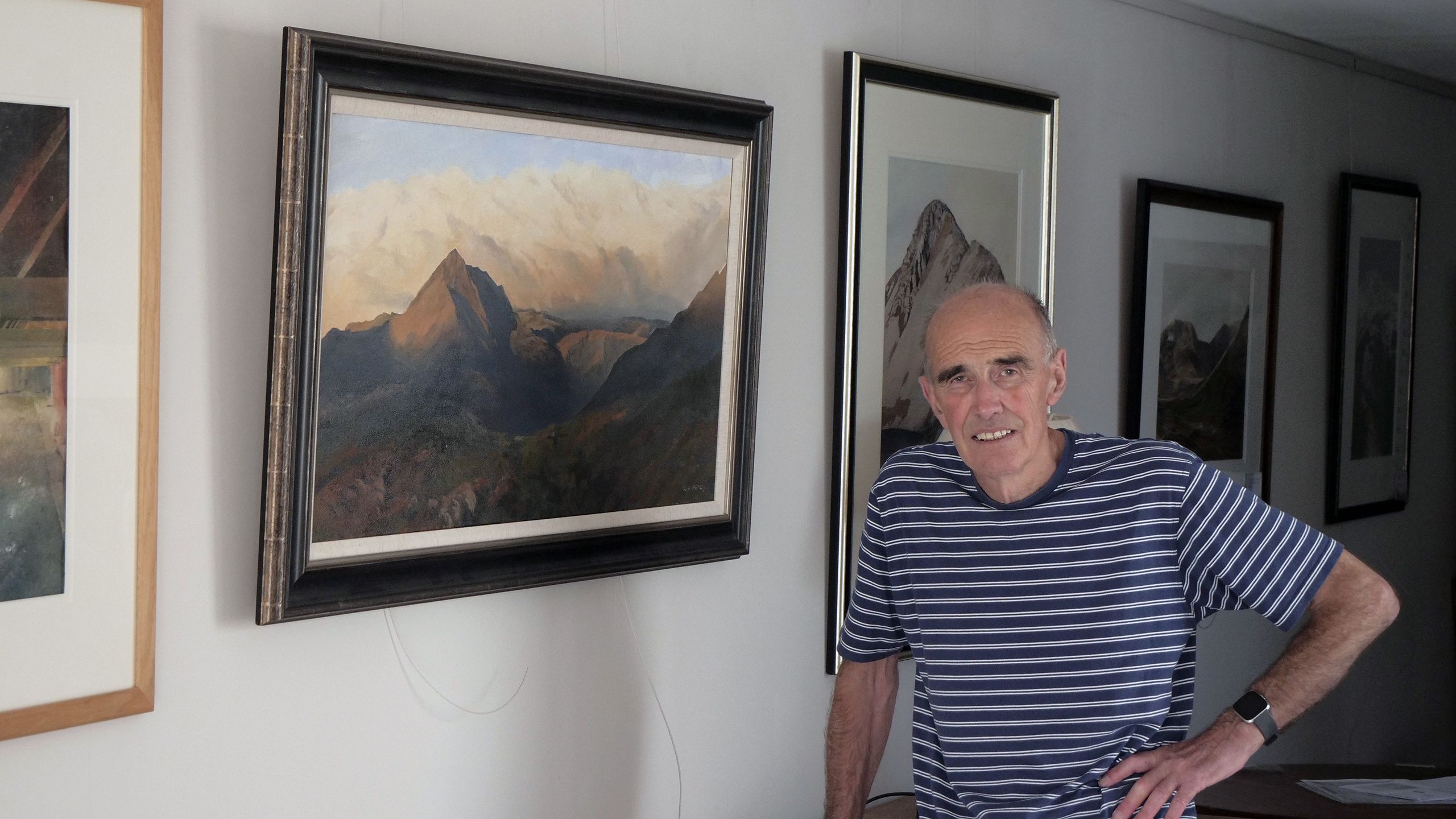 Rob Piercy o flaen llun o'r Cnicht