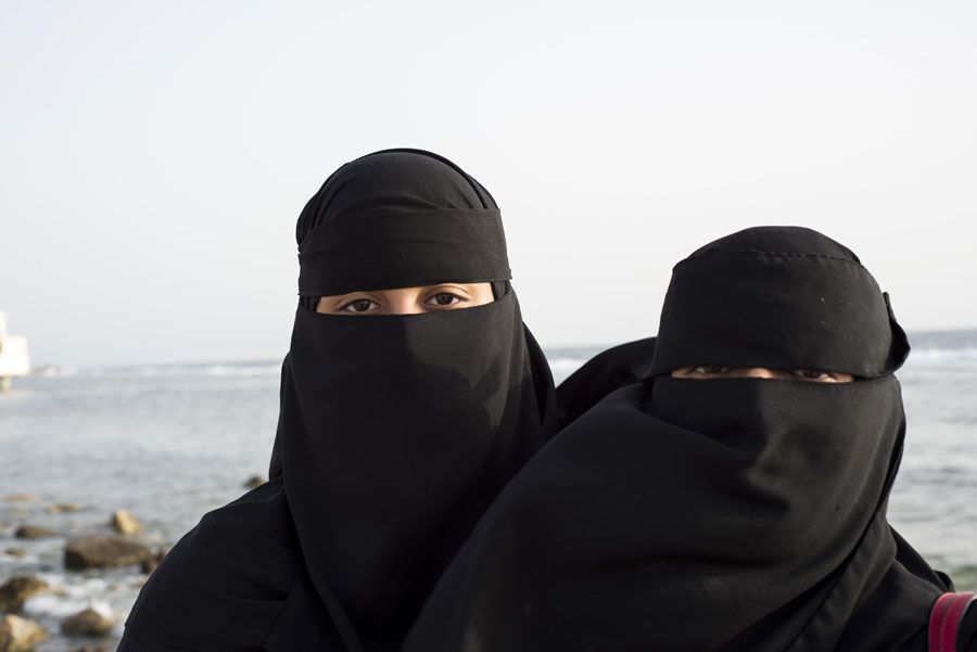 Two women in full headdress, in Jeddah