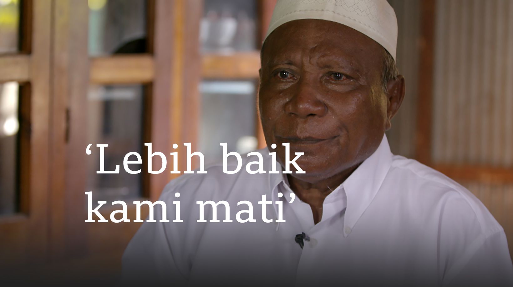 Foto Amin dengan tulisan "Lebih baik kami mati".