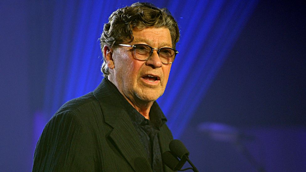  Robbie Robertson accepts an award onstage during the 2019 amfAR Gala Los Angeles at Milk Studios on October 10, 2019 in Los Angeles, California.