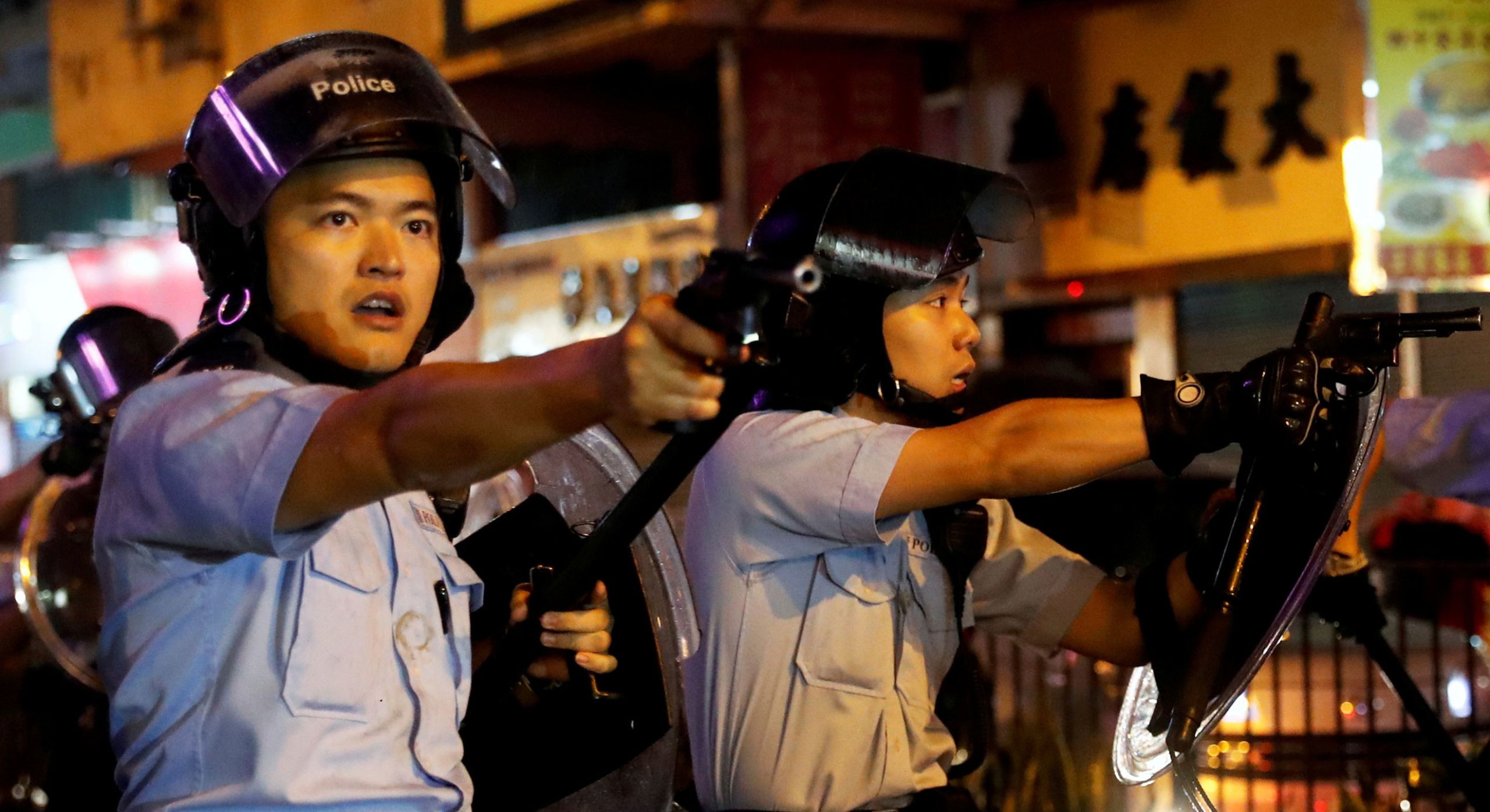 Police point guns