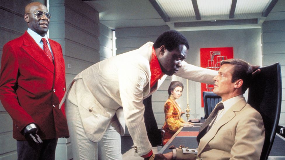 Yaphet Kotto (c) in Live and Let Die with Roger Moore as James Bond