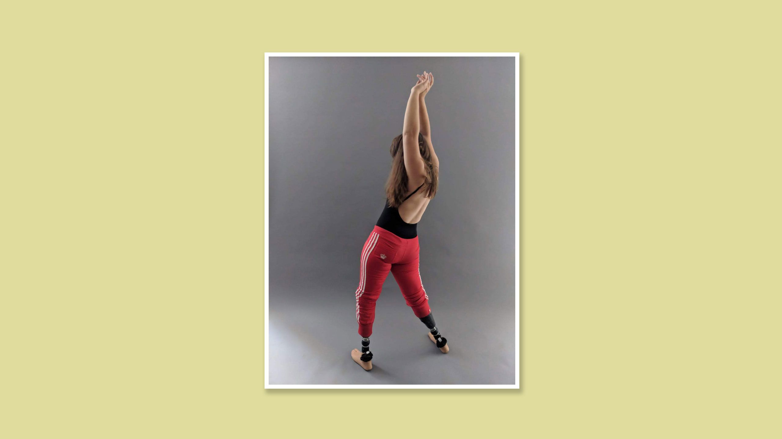 Kat dancing in bright red leggings