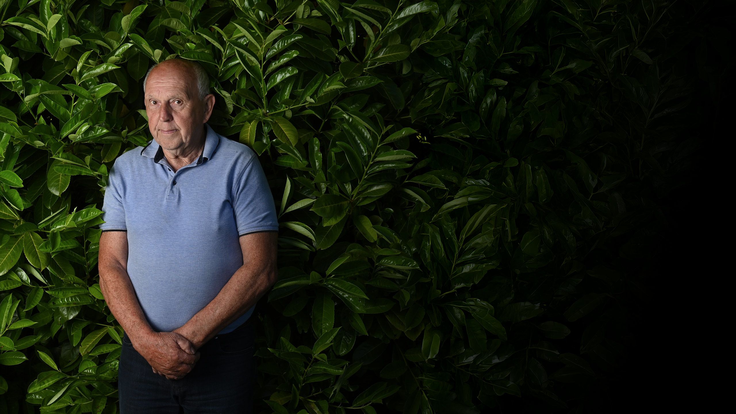 PJ Haverty pictured against a bush in the memorial garden.
