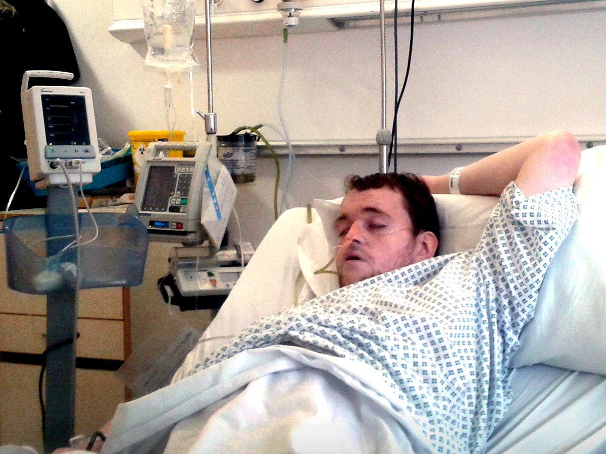 Mark in a hospital bed at the Royal Blackburn Hospital
