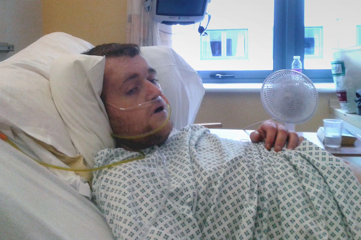 Mark in a hospital bed at the Royal Blackburn Hospital