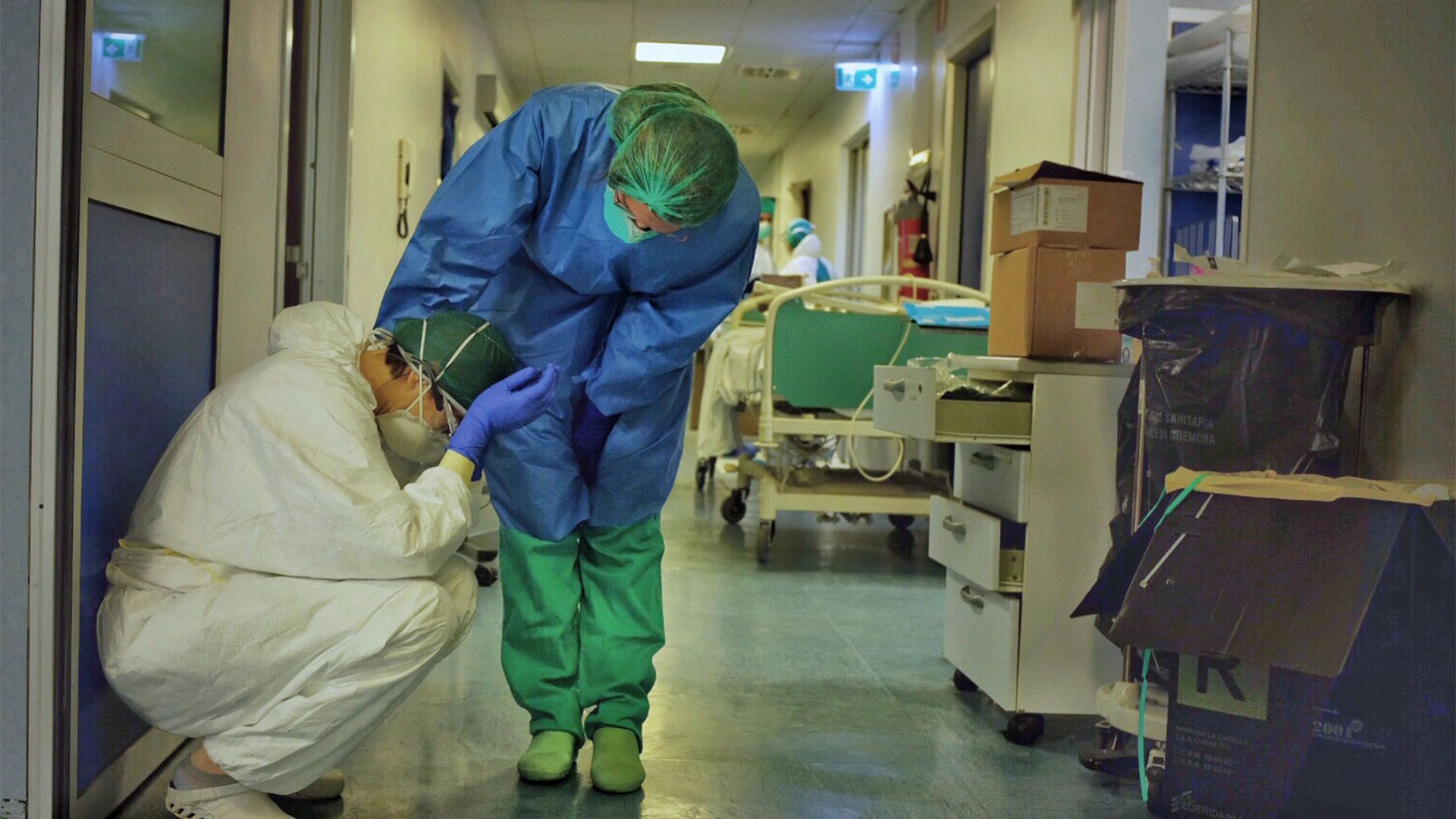 A distressed nurse, comforted.