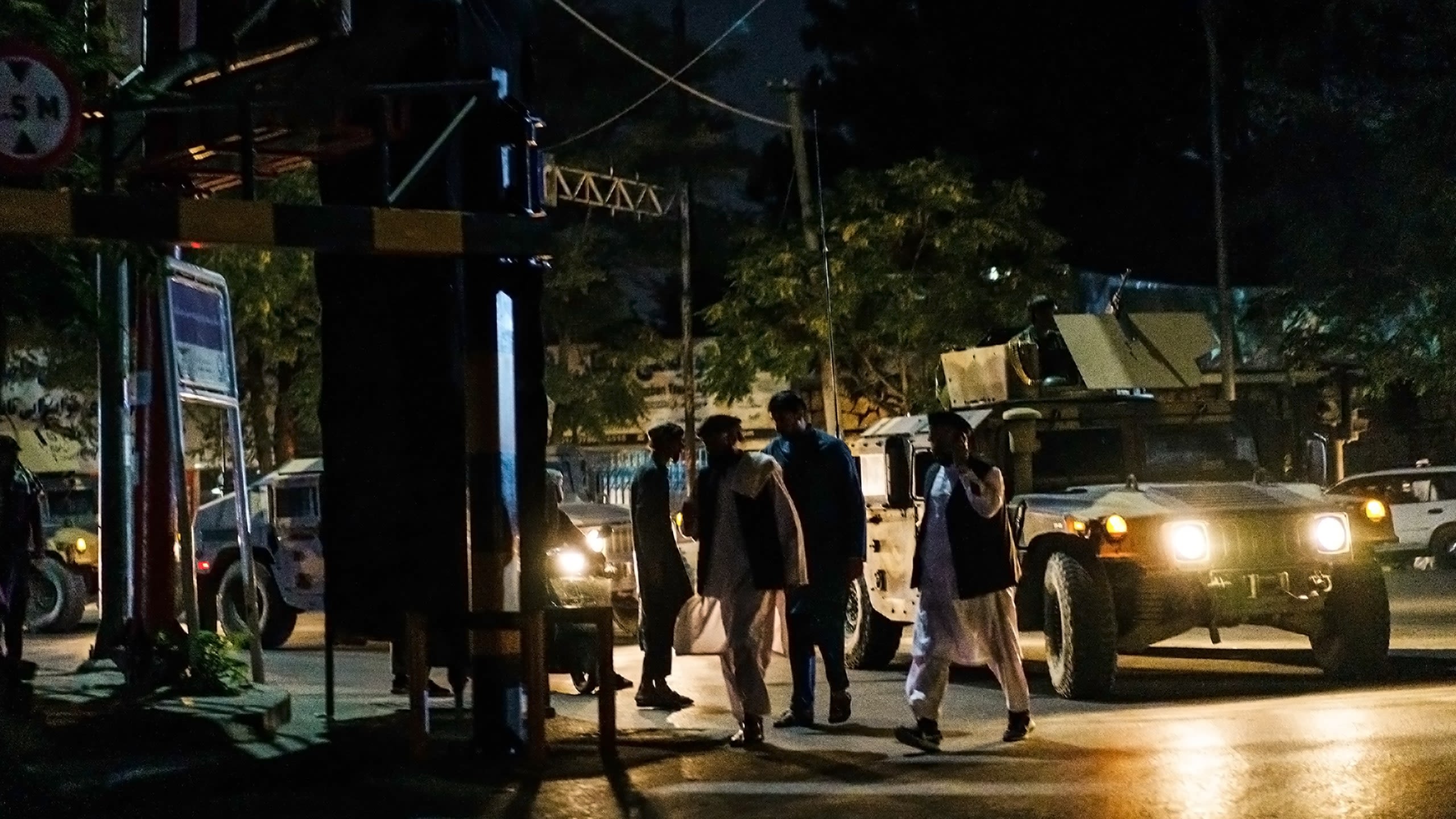 A military vehicle with unidentified militants patrolling in a street in Kabul, Aug. 15, 2021.