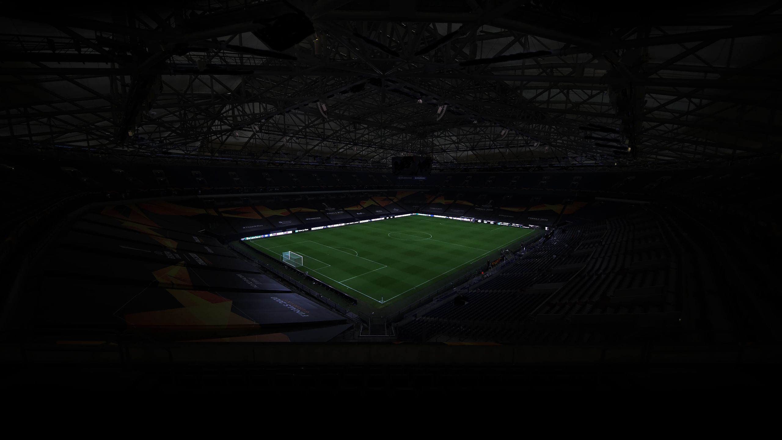 An interior view of the stadium in Gelsenkirchen in largely darkness