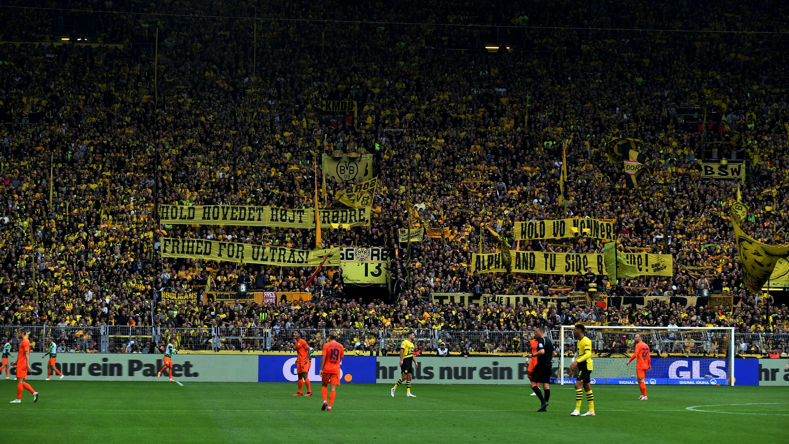 A shot of the famed "Yellow Wall" in full colour inside Dortmund stadium
