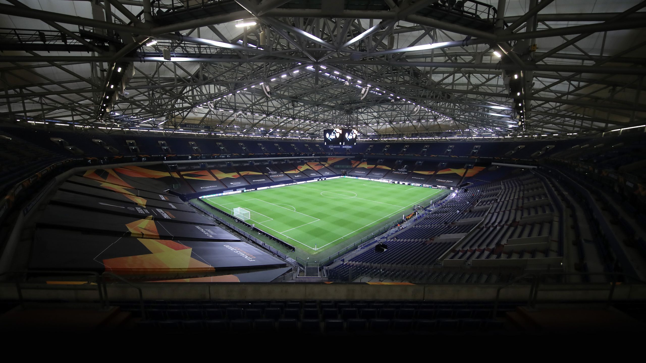 An interior view of the stadium in Gelsenkirchen with lights on