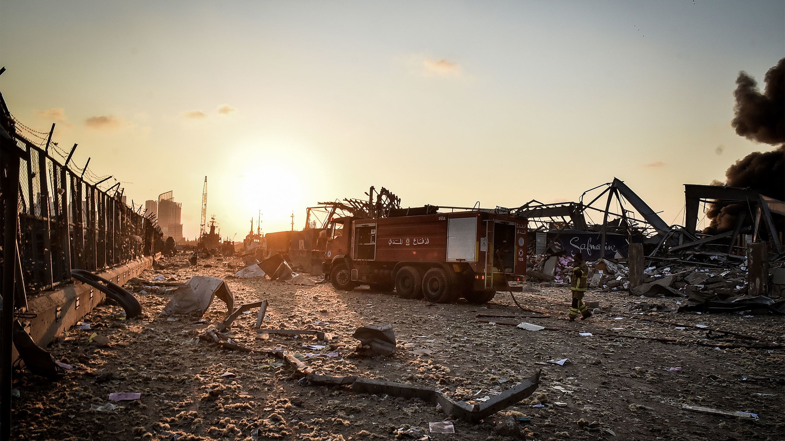 Firefighters approach the blast zone