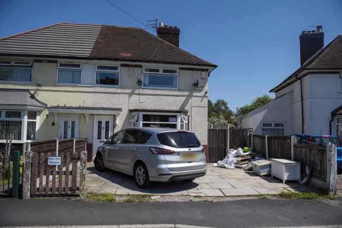 Front of Joanne's house, with car in front