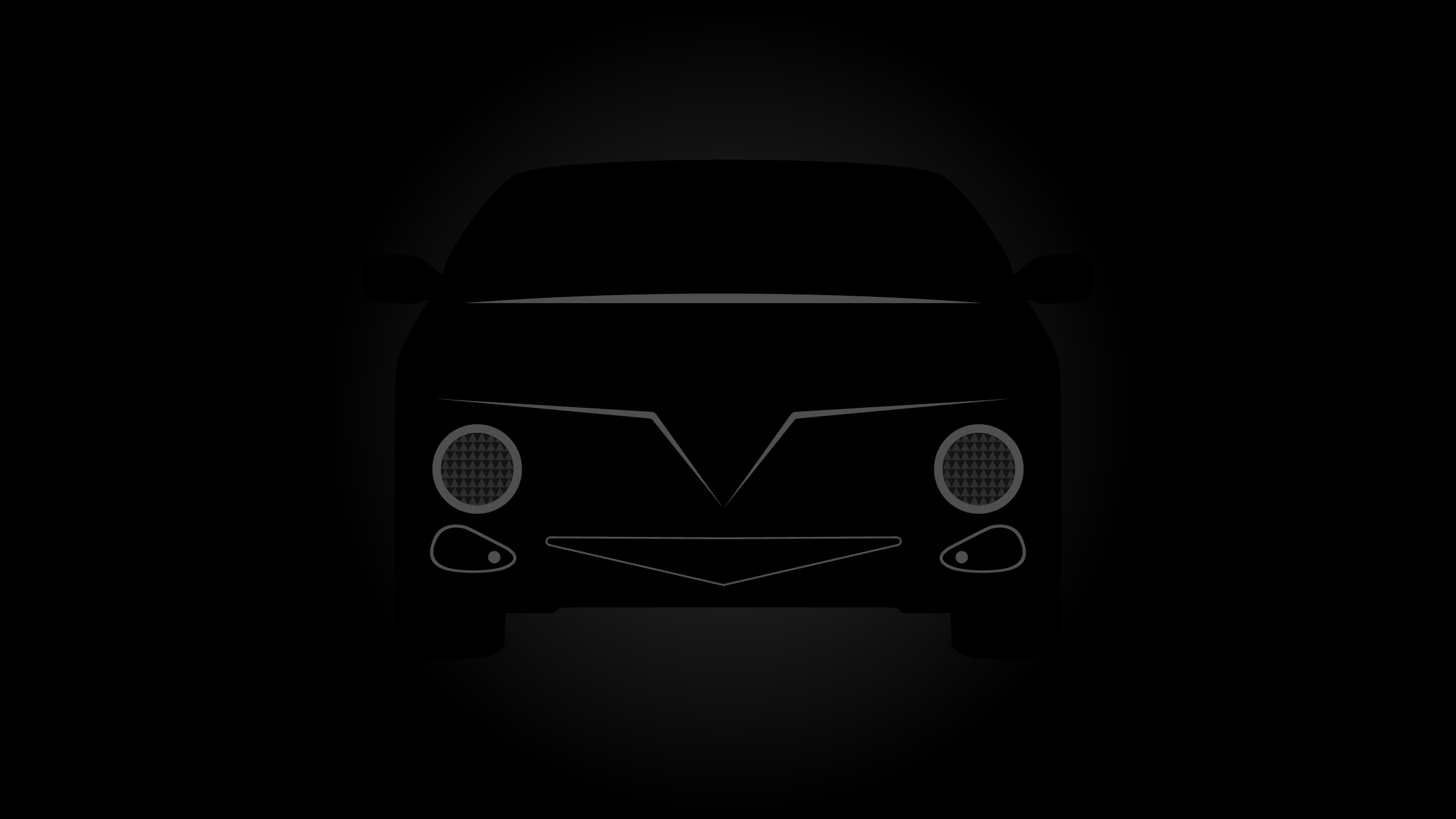 Obrisi tamnog automobila u mraku.