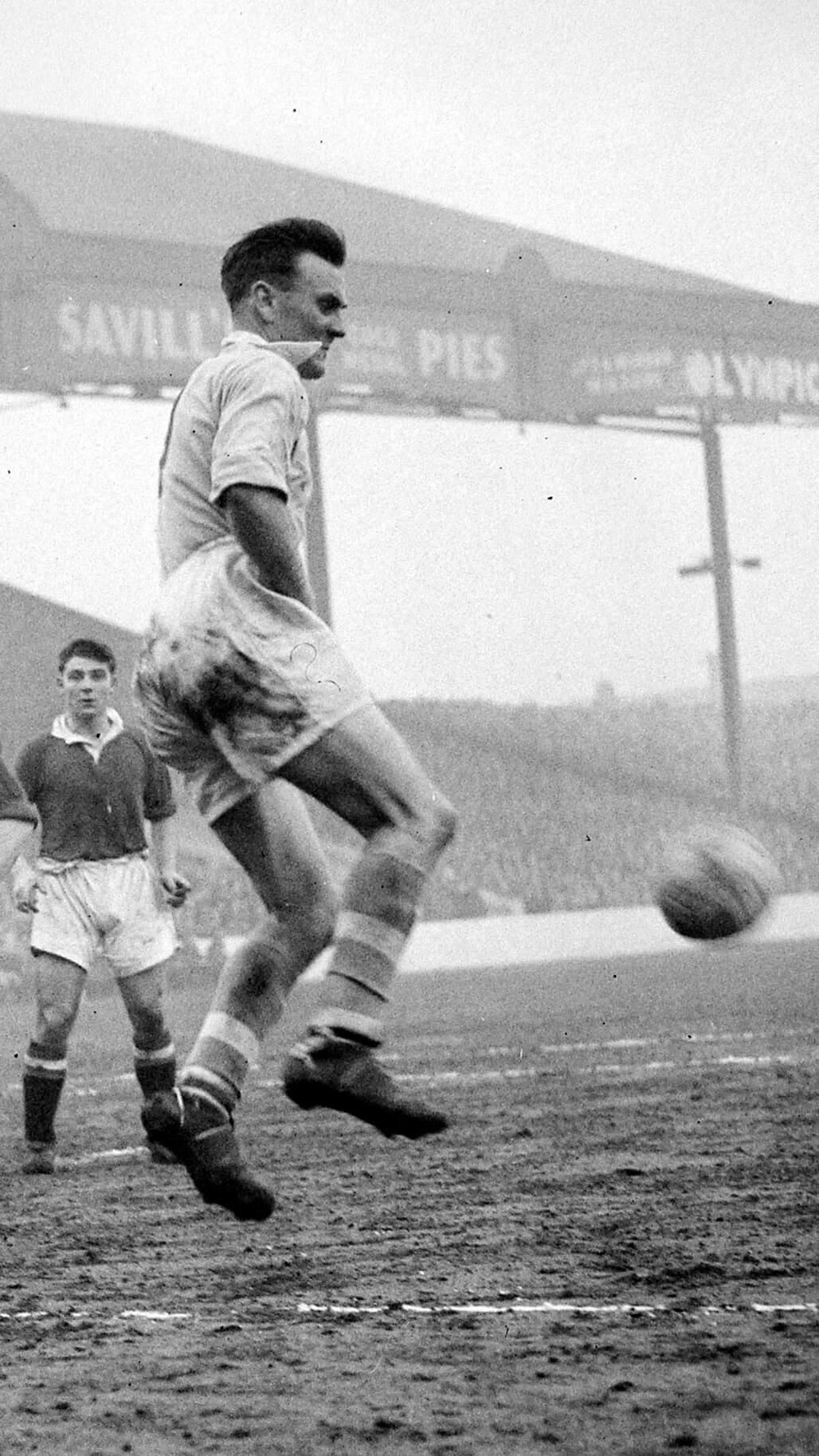 FA Cup match at Maine Road. Manchester City v Manchester United (2-0) - Don Revie of City head the ball to one of his colleagues during the match on 29th January 1955