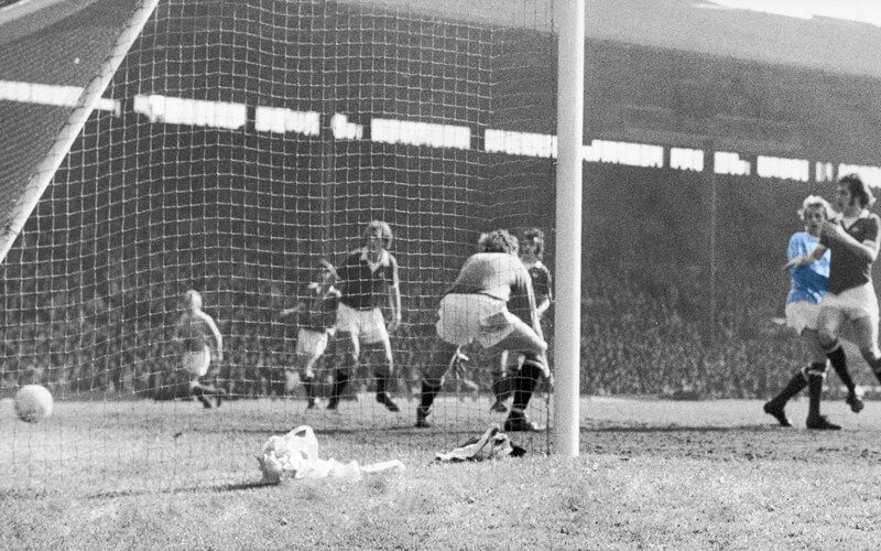 Denis Law backheels his goal against Manchester United at Old Trafford in 1974
