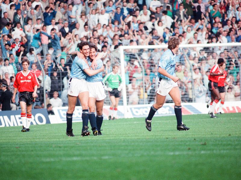 Paul Lake and Ian Bishop celebrate during City's 5-1 win over United in a 1989 Manchester derby