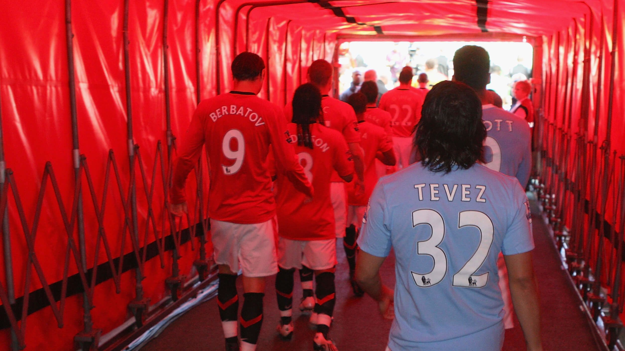 Carlos Tevez of Manchester City walks out ahead of the FA Barclays Premier League match between Manchester United and Manchester City at Old Trafford on 20th September 2009