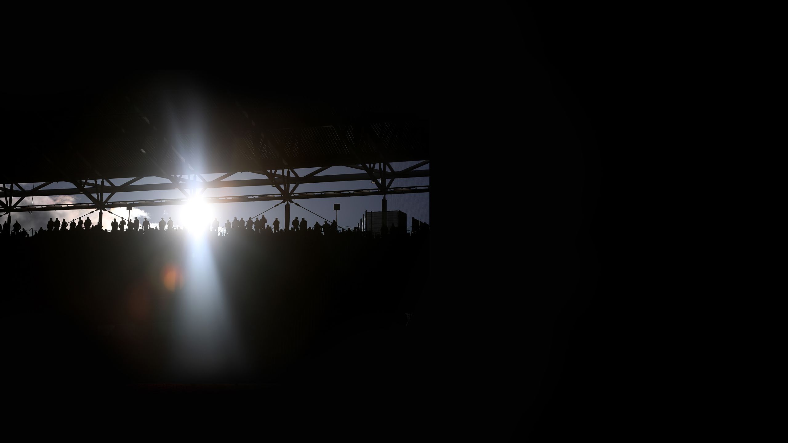 Sun shines through a gap in the stands at the stadium in Leipzig