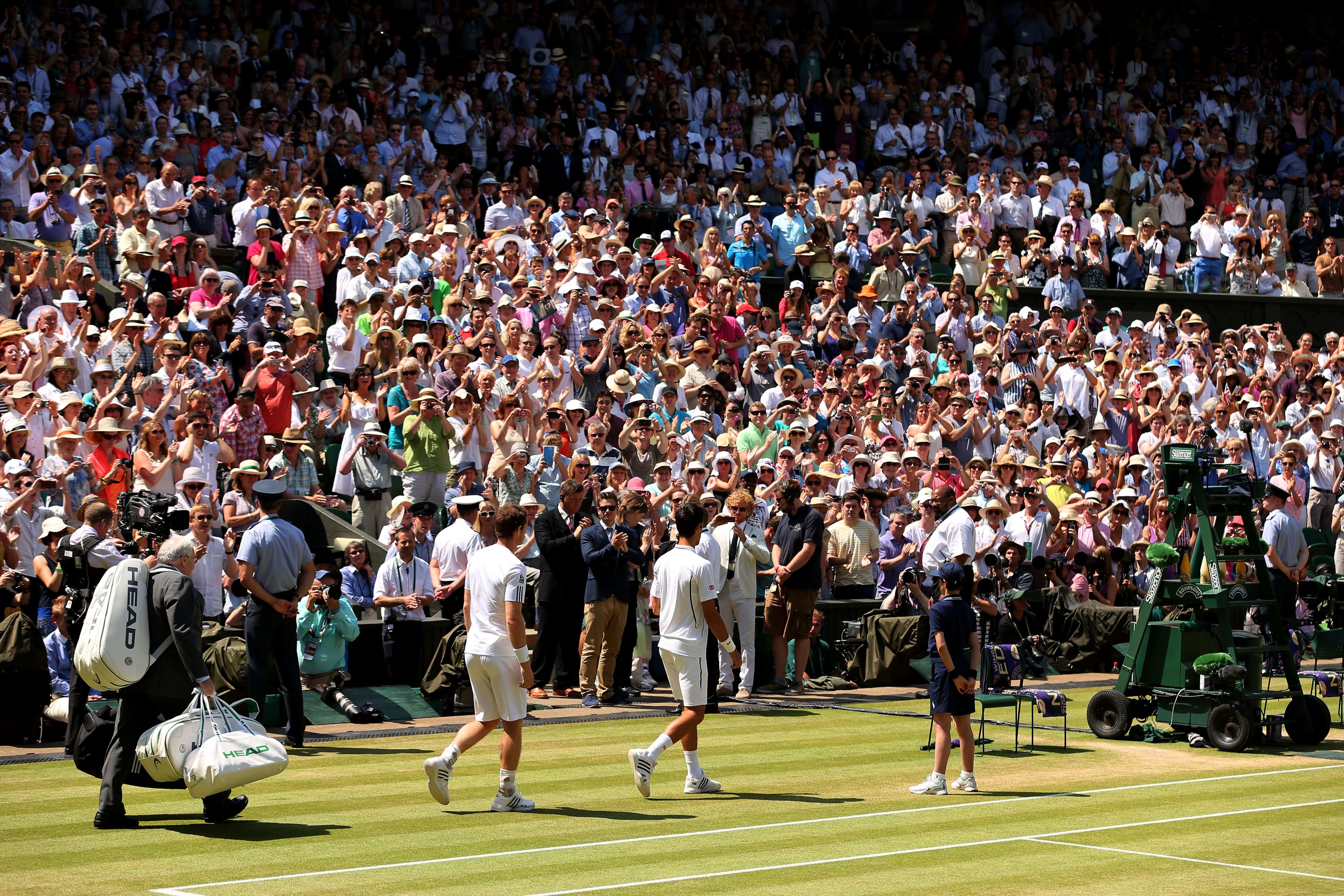 Novak Djokovic leads Andy Murray out on the Centre Court for the 2013 men's final