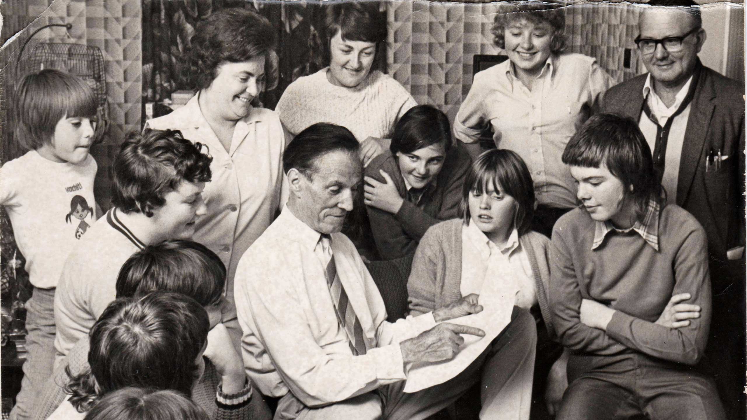 Harry Batt surrounded by his players