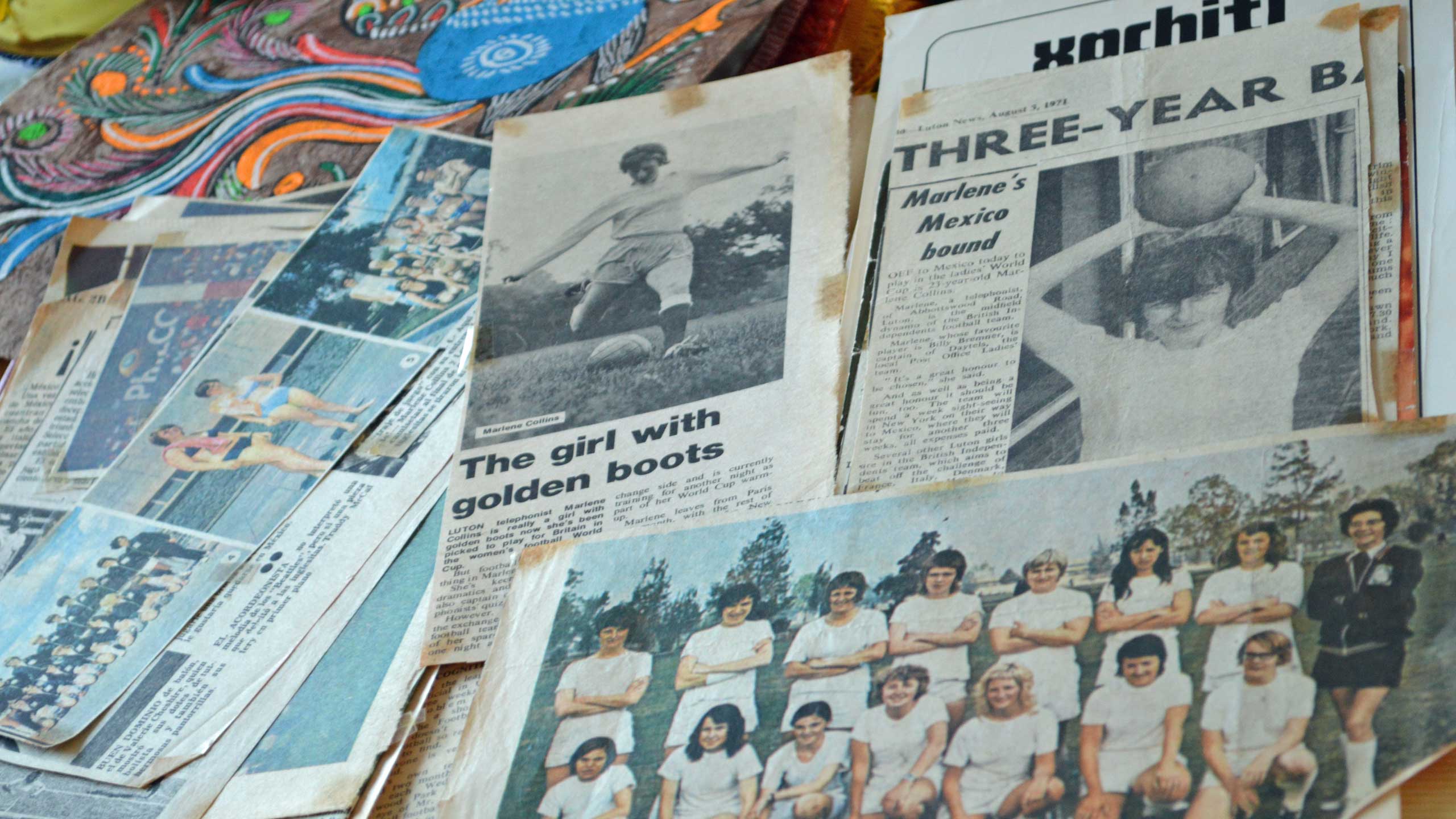 Newspaper cuttings and other items from a scrapbook