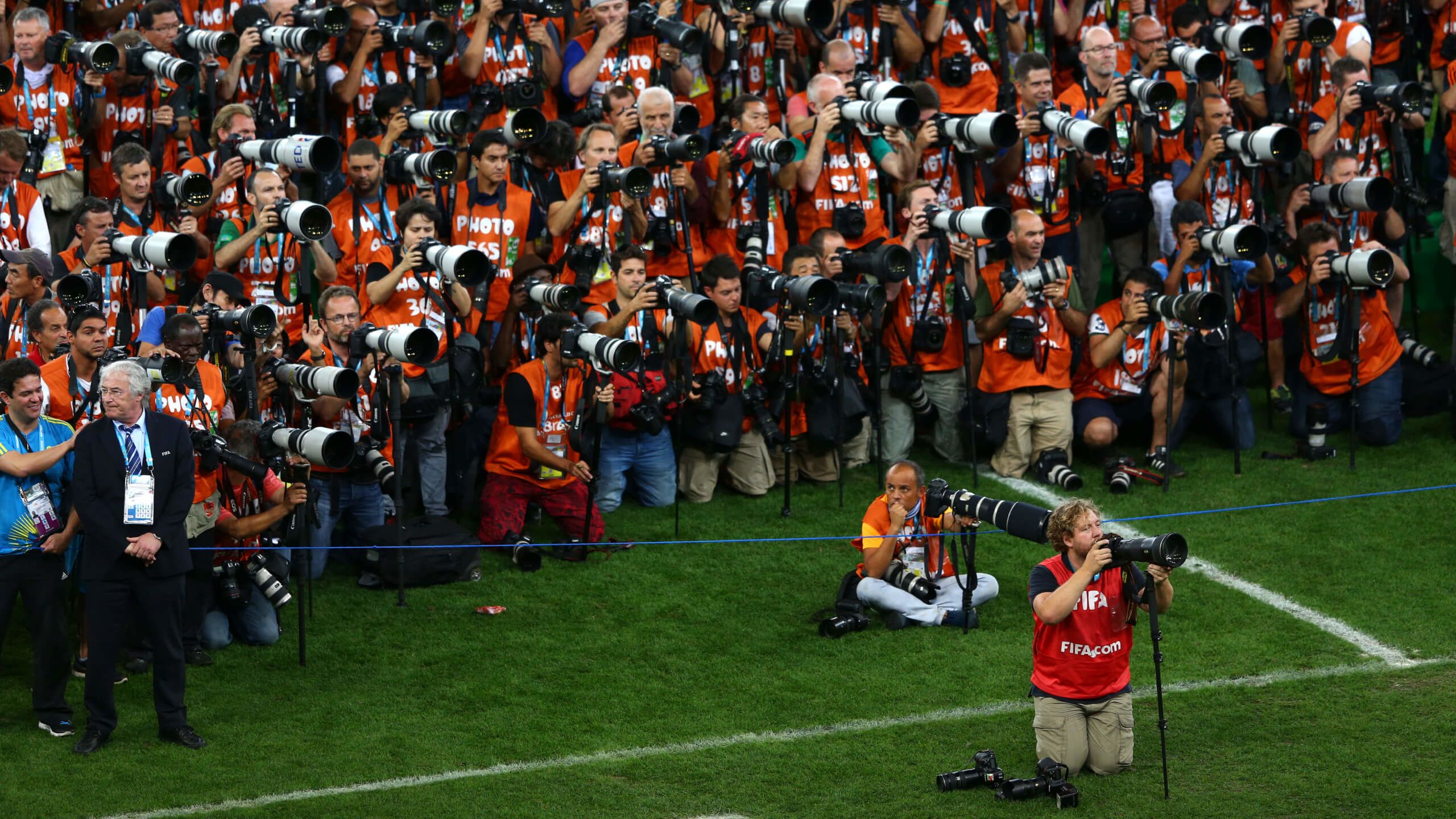 Photographers gather to take photos at the 2014 World Cup final