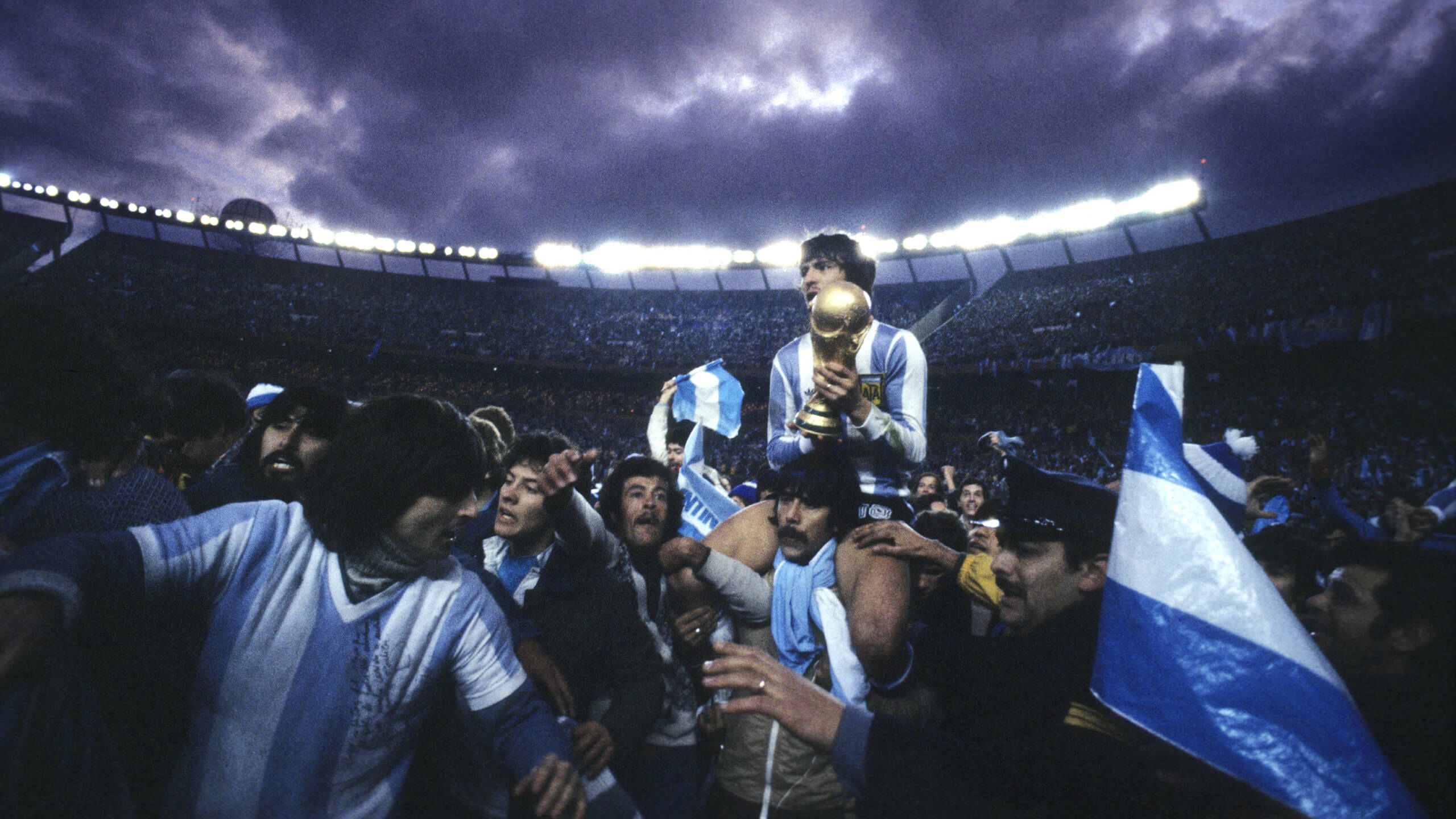 Argentina's Daniel Passarella holds the World Cup trophy in 1978