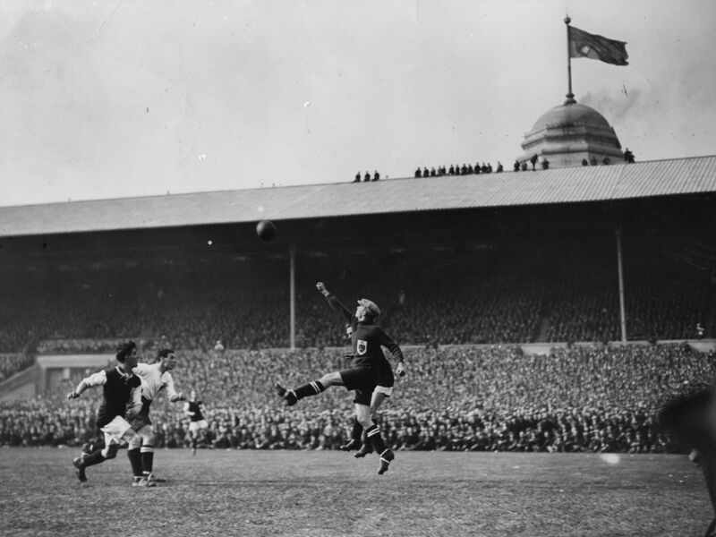 The ball is punched away by the goalkeeper during the 1923 FA Cup Final between West Ham United and Bolton Wanderers