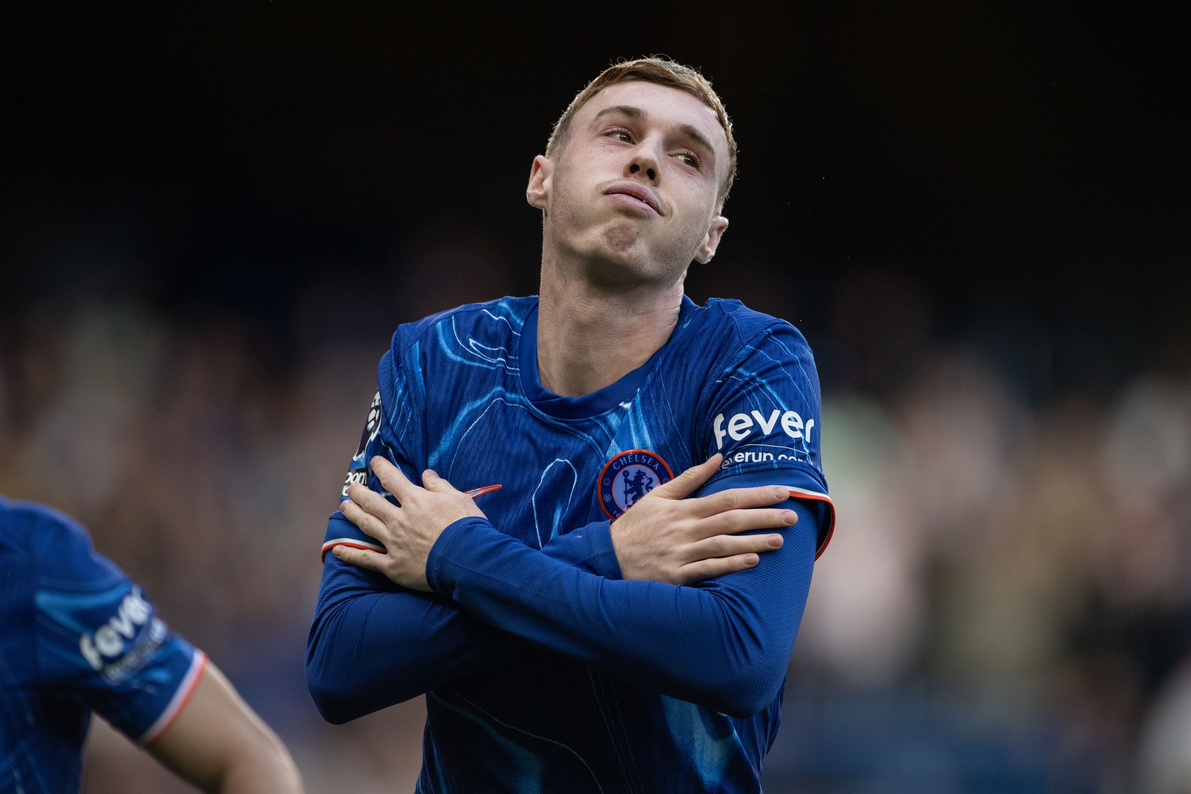 An image of Cole Palmer celebrating scoring a goal