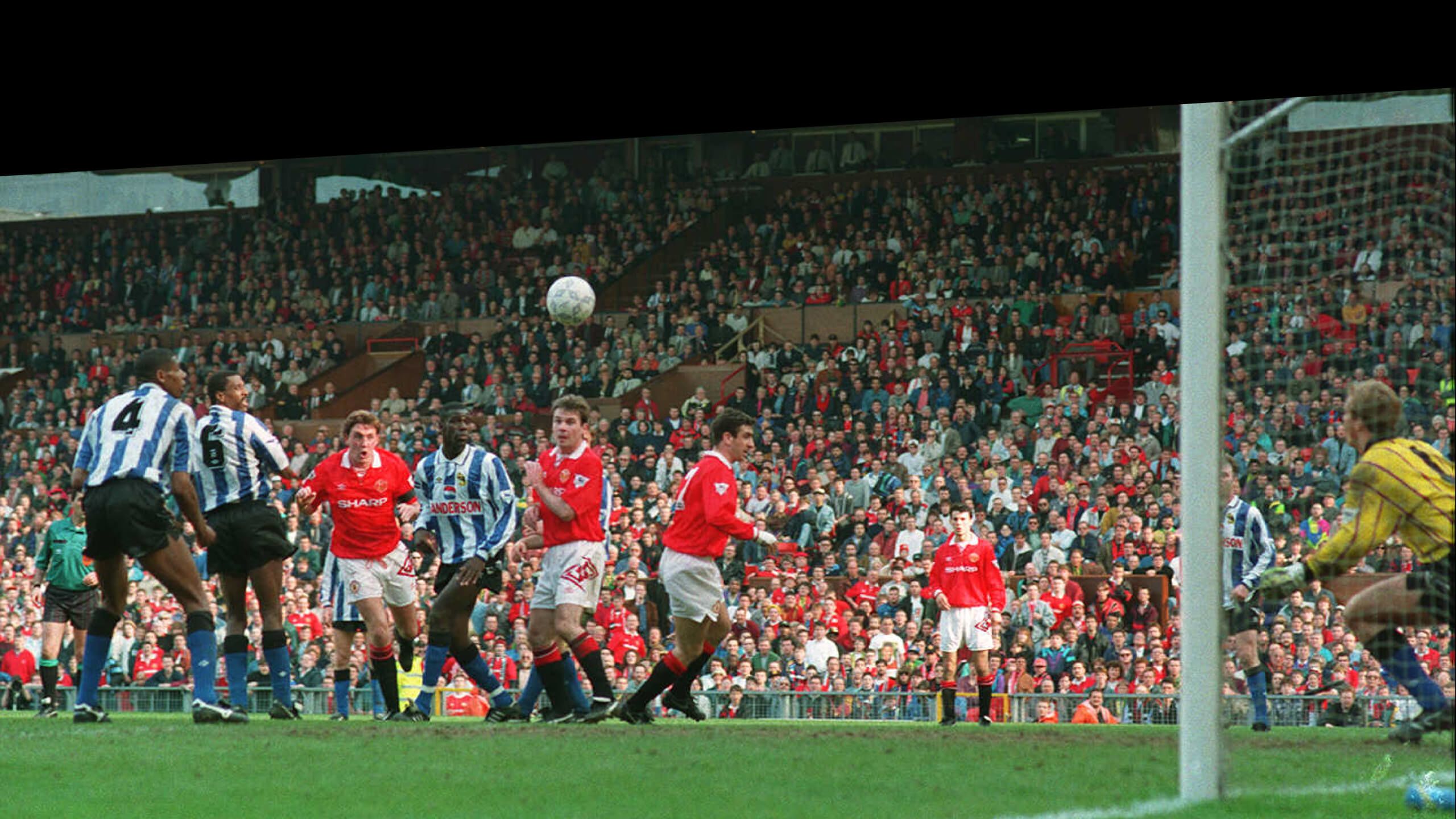 Steve Bruce scores for Manchester United against Sheffield Wednesday in 1992-93