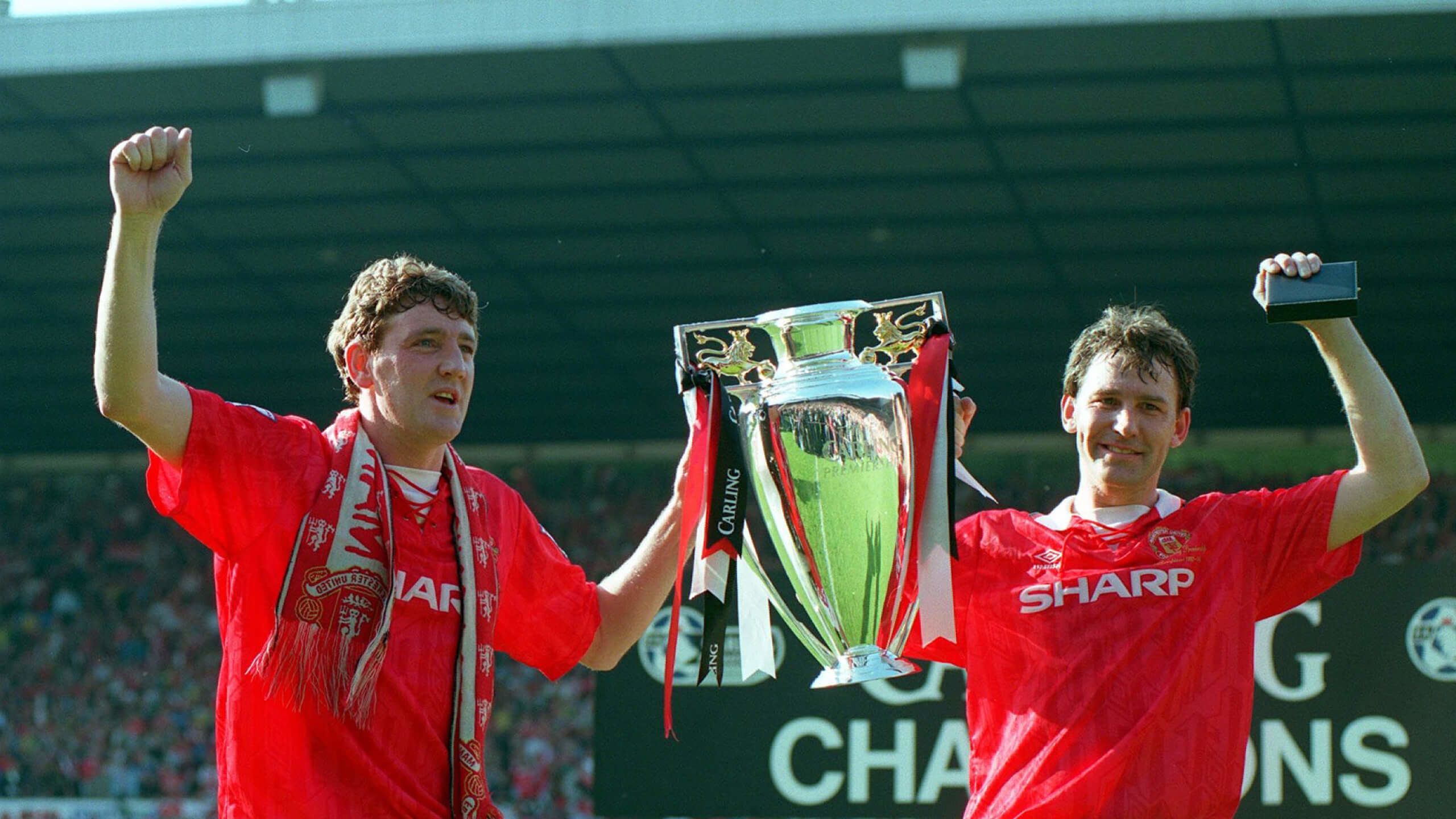 Steve Bruce and Bryan Robson with the Premier League trophy in 1993