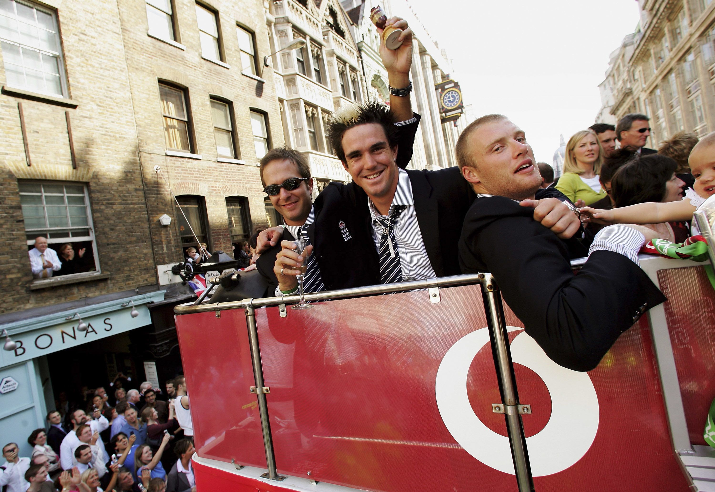 Michael Vaughan, Kevin Pietersen and Andrew Flintoff during open top bis parade to celebrate England's 2005 Ashes win