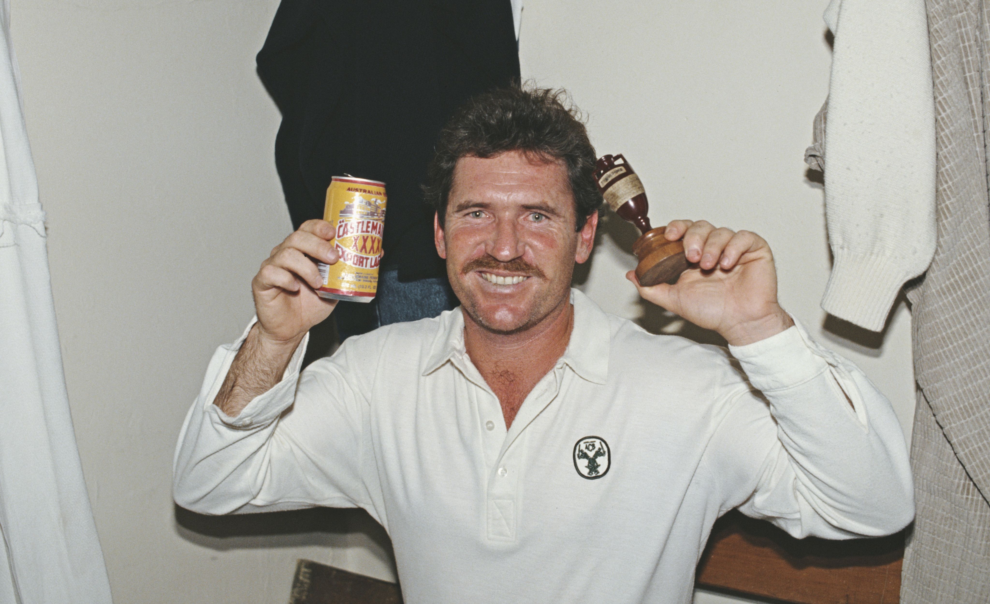 Allan Border with Ashes urn