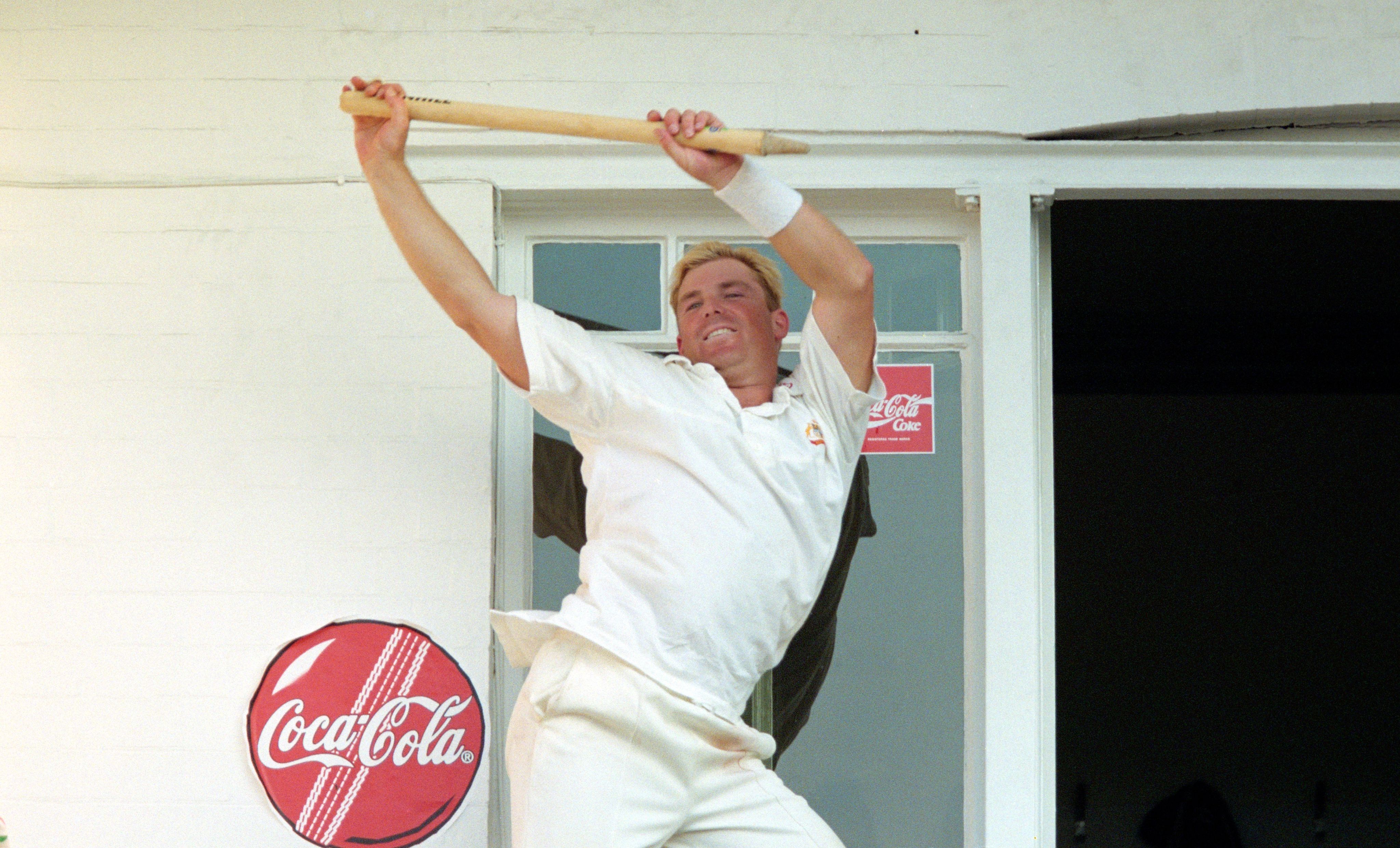 Shane Warne celebrates Ashes win by dancing with a stump