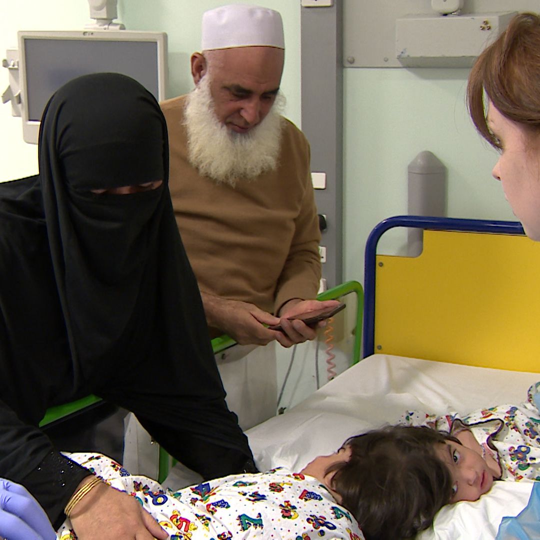 Zainab comforts the twins