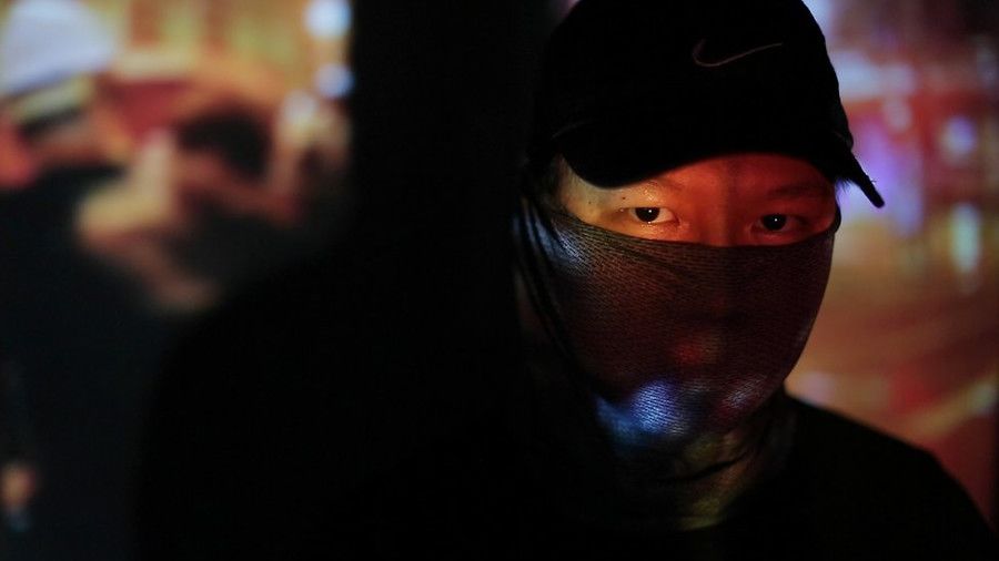 黑衣人吳生（BBC News中文圖片）