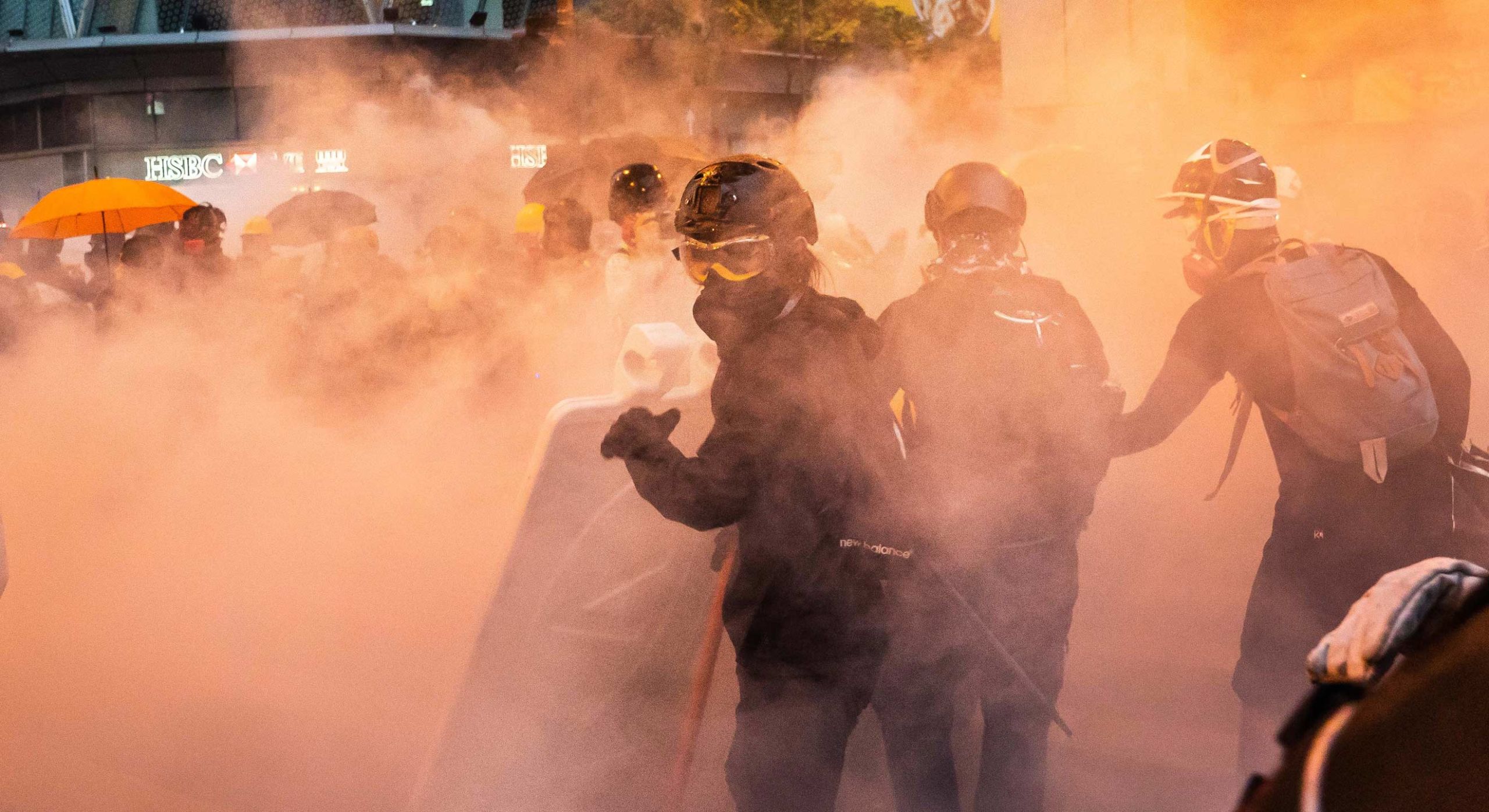 Protesters in cloud of tear gas