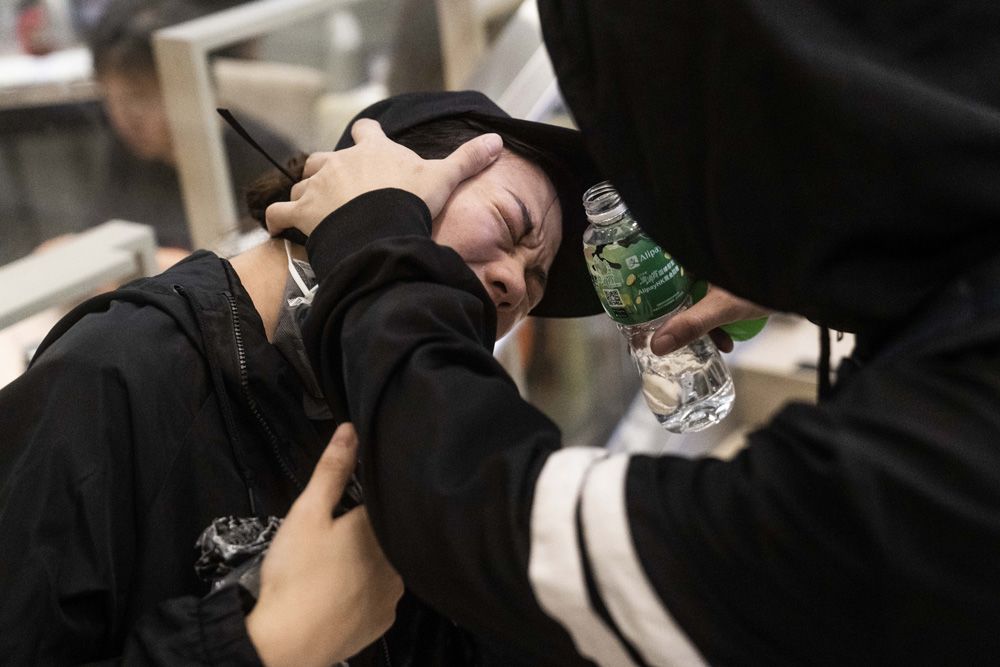 Washing protester's eyes