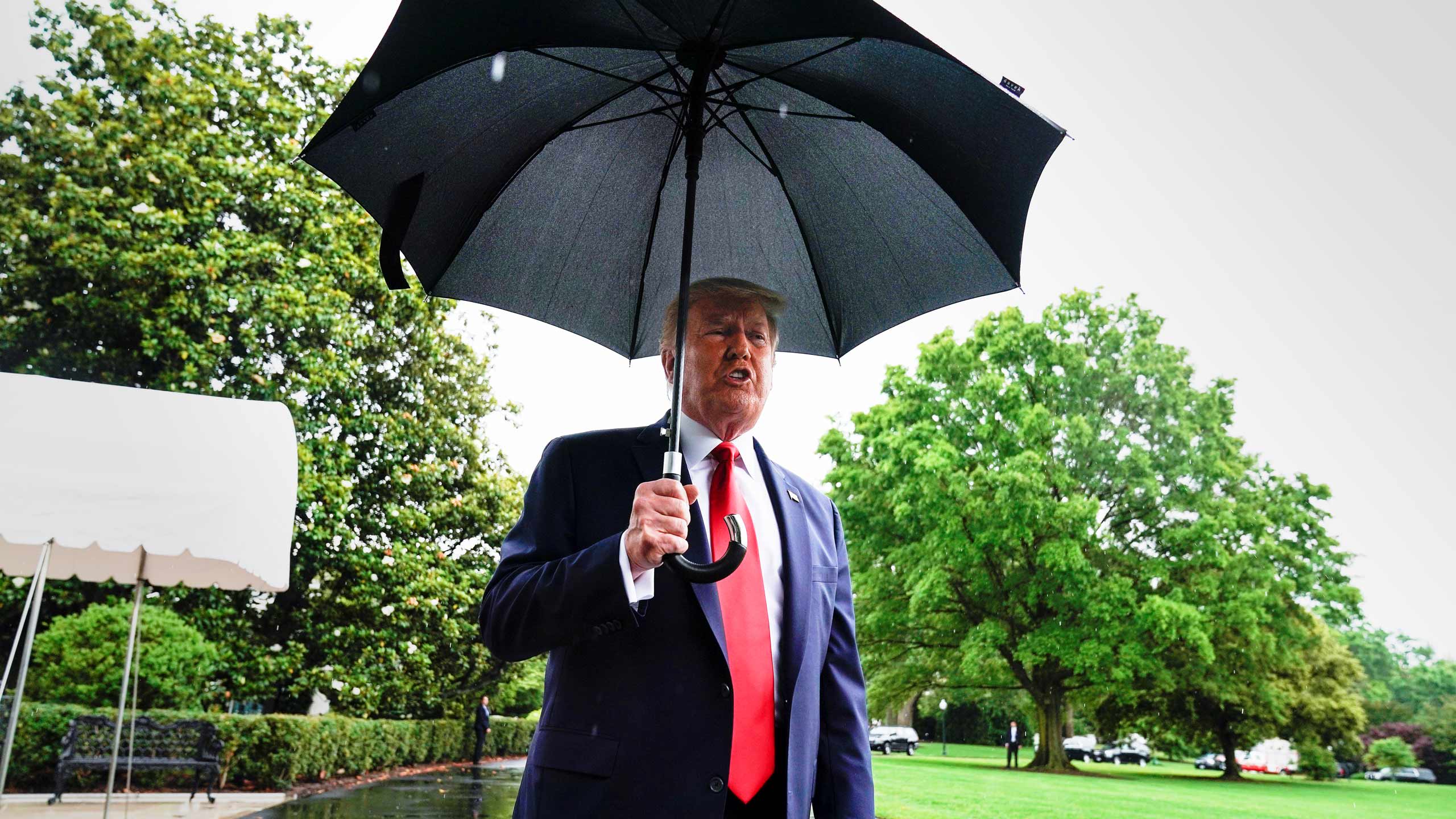 President Trump talks to reporters at the White House, before leaving for Tulsa