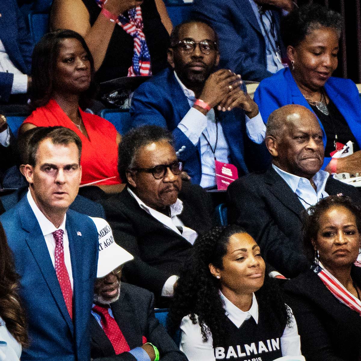 Herman Cain (centre-right) and Kevin Stitt (centre-left)