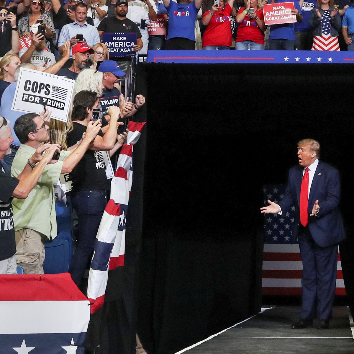 President Trump enters the BOK Center auditorium