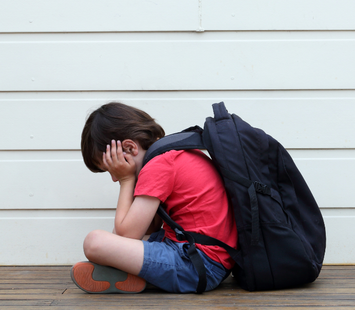 Young boy with backpack