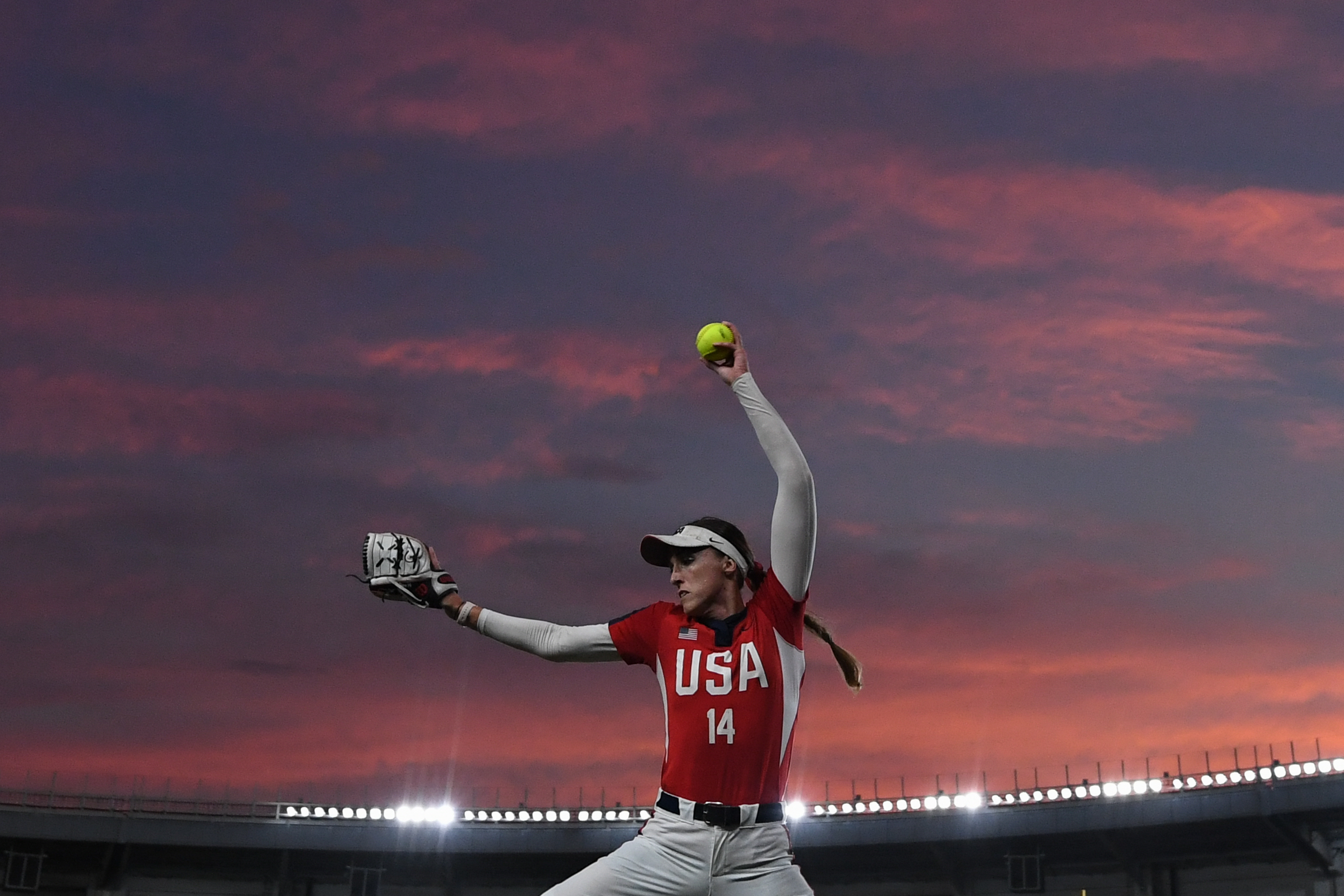 Monica Cecilia Abbott # 14 from the USA warms up before a match between Japan and the United States during the WBSC Women's Softball World Championship, 11 August 2018, in Chiba, Japan.