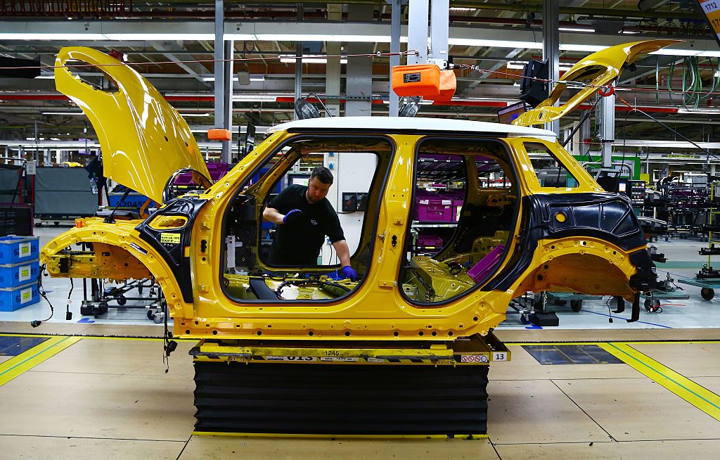 A car being assembled in a factory