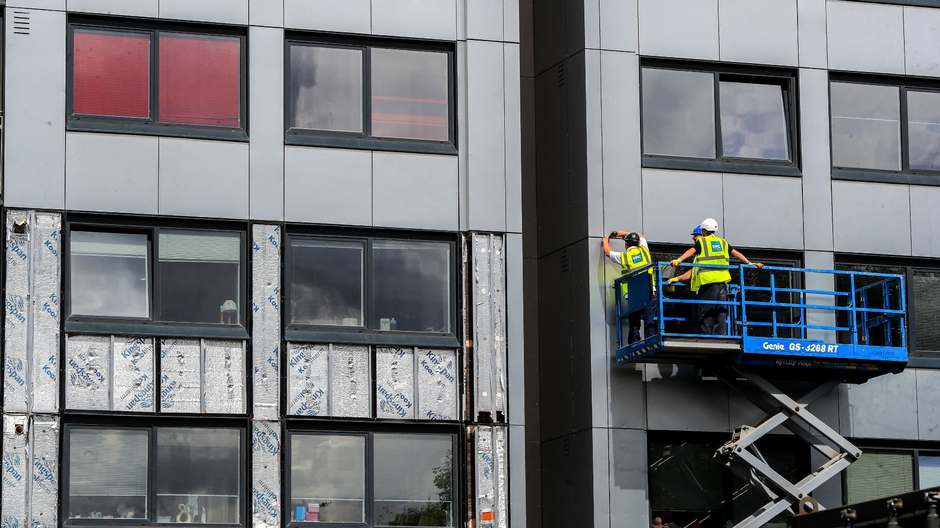 Cladding being removed from Whitebeam Court, in Pendleton, Greater Manchester.