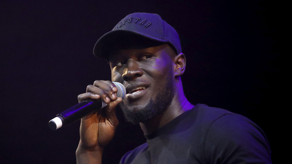 Stormzy's Glastonbury performance 'will be iconic' but he won't be dancing - BBC News