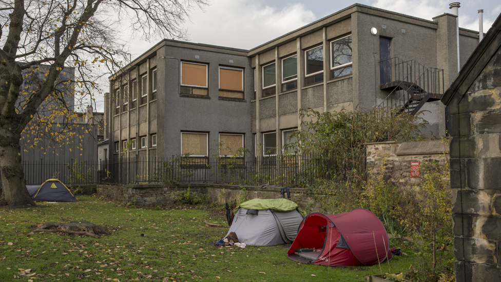 Homeless people living in tents