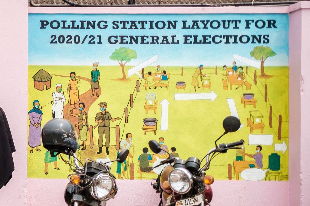 Graffiti on a wall shows a polling station's layout at the electoral commission headquarters in Kampala, Uganda